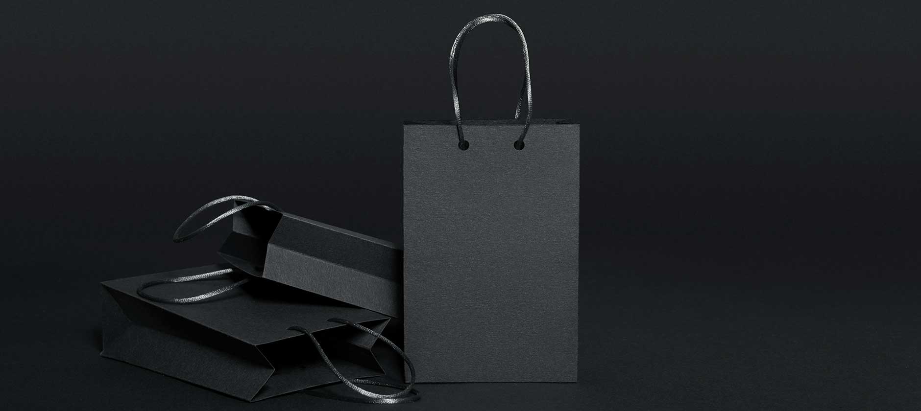 Black bags on a black surface